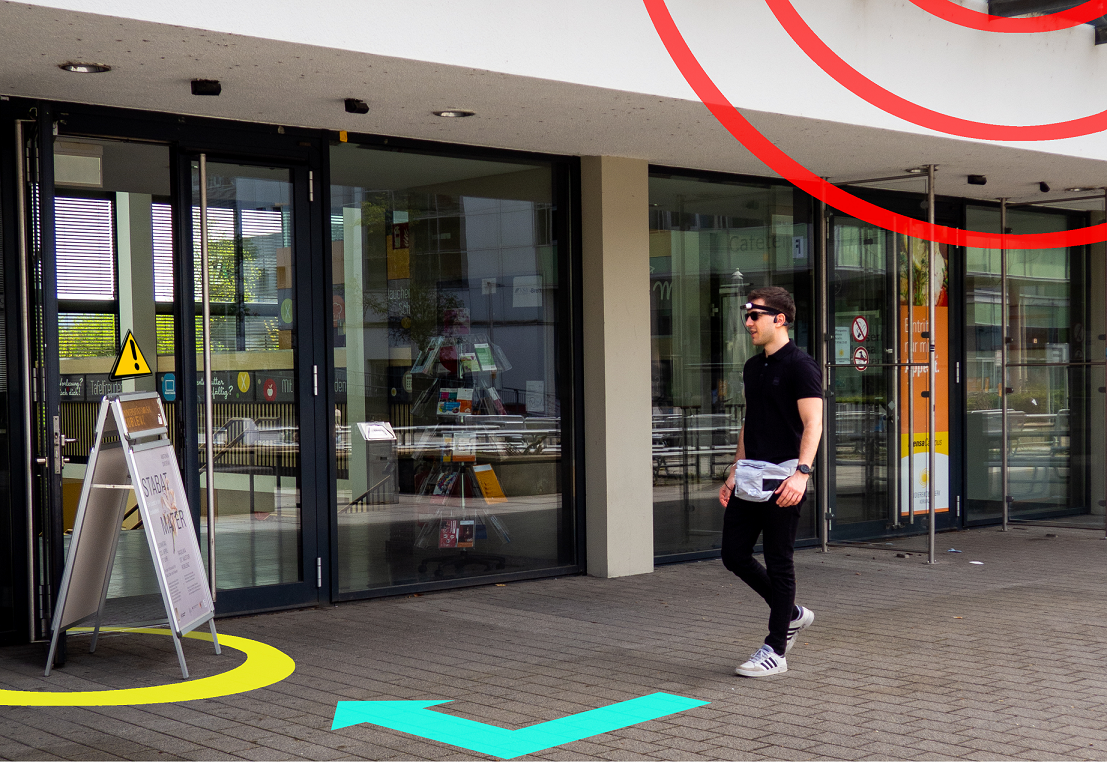 Die Arbeitsgruppe Aktives Sehen (AGAS) entwickelt ein KI-basiertes Assistenzsystem, das den Uni-Alltag für Personen mit Sehbeeinträchtigung vereinfacht, etwa durch eine intelligente Positionsbestimmung und Kollisionserkennung. Foto: Projekt VISITKO